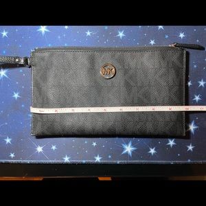 Michael Kors Jet Set Large Black Zipped Leather MK Clutch